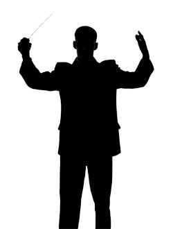 Managing the Unpredictable - Silhouette of a conductor