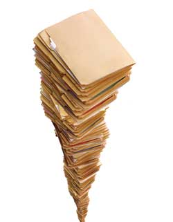 The Death of the Filing Cabinet - Stack of files