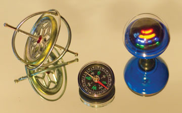 There’s the Rub - Toy gryo, magnetic compass and spinning top