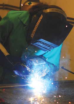 Input Output - High-school girls make sparks fly during welding classes