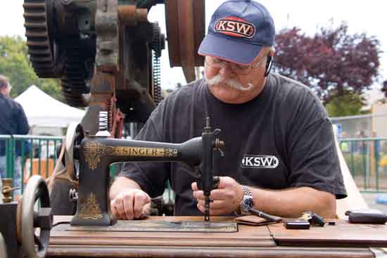 The Power of the Past - A volunteer at the sewing machine