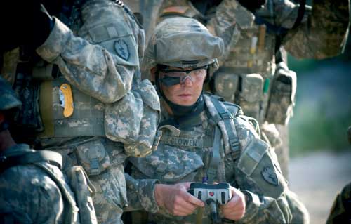 The Drone Warrior - Soldier operates small ground robot