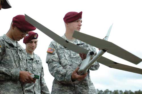 The Drone Warrior - Paratroopers hold a Raven drone