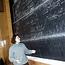 Professor At Chalk Board