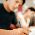 Blurred Male Student Writing