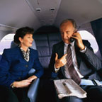 Business Man and Woman In Private Jet