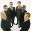 Circle Of Business Men Looking Up