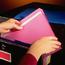 Pulling Pink File From Drawer