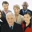 Group Of Smiling Professionals Looking Up