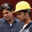 Two Men One With Hard Hat