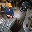 Worker Assembling Parts