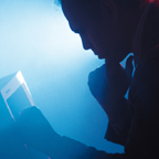 Silhouette Working At Computer
