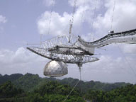 Arecibo Radiotelescope Against A Blue Sky